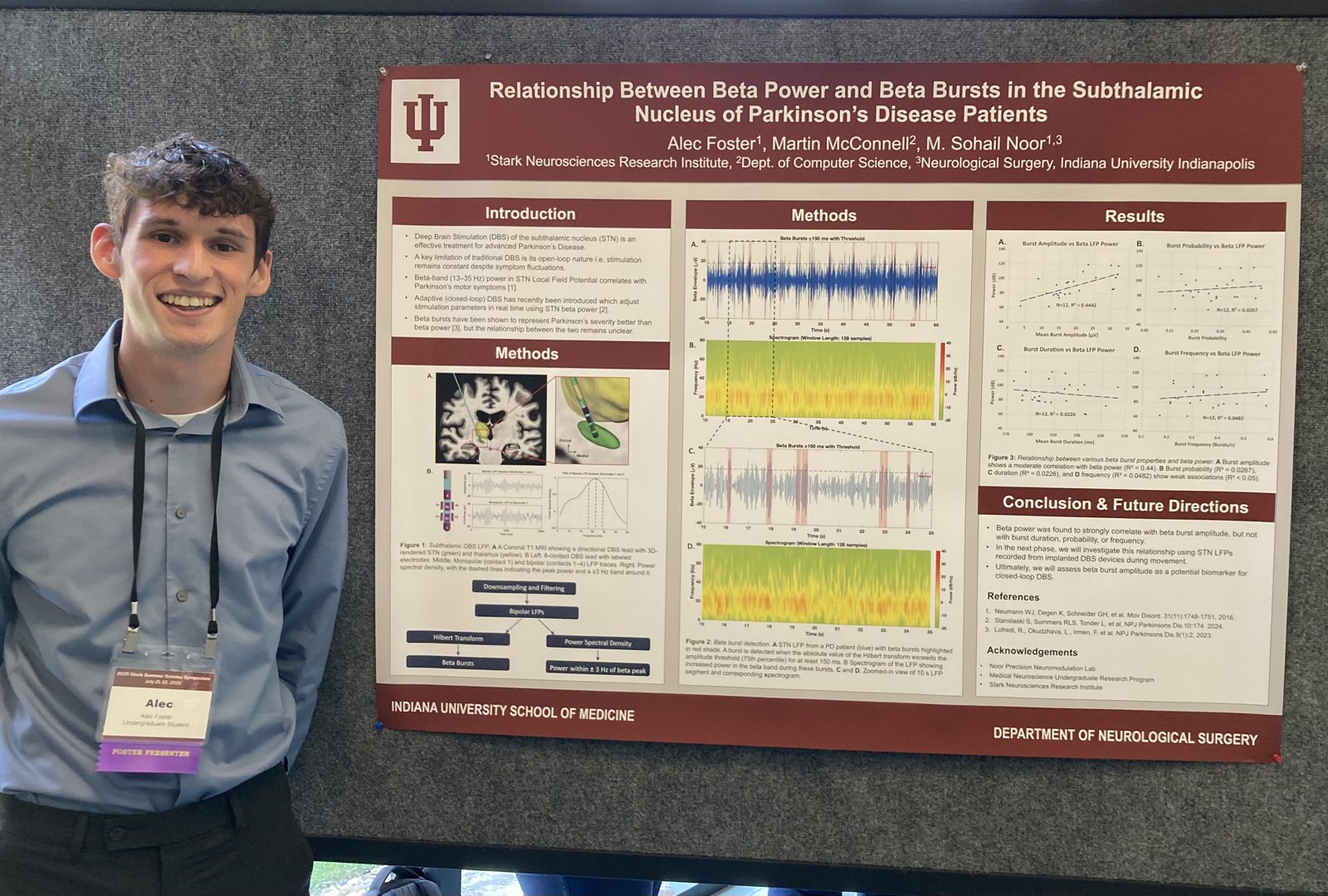 Alec Foster presenting his award-winning poster at the Stark Summer Science Symposium